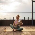 full-shot-woman-doing-sport-with-dog