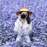 tourist-take-photo-with-digital-camera-margaret-flowers-fields