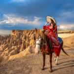 tourists-enjoy-ride-horses-cappadocia-turkey